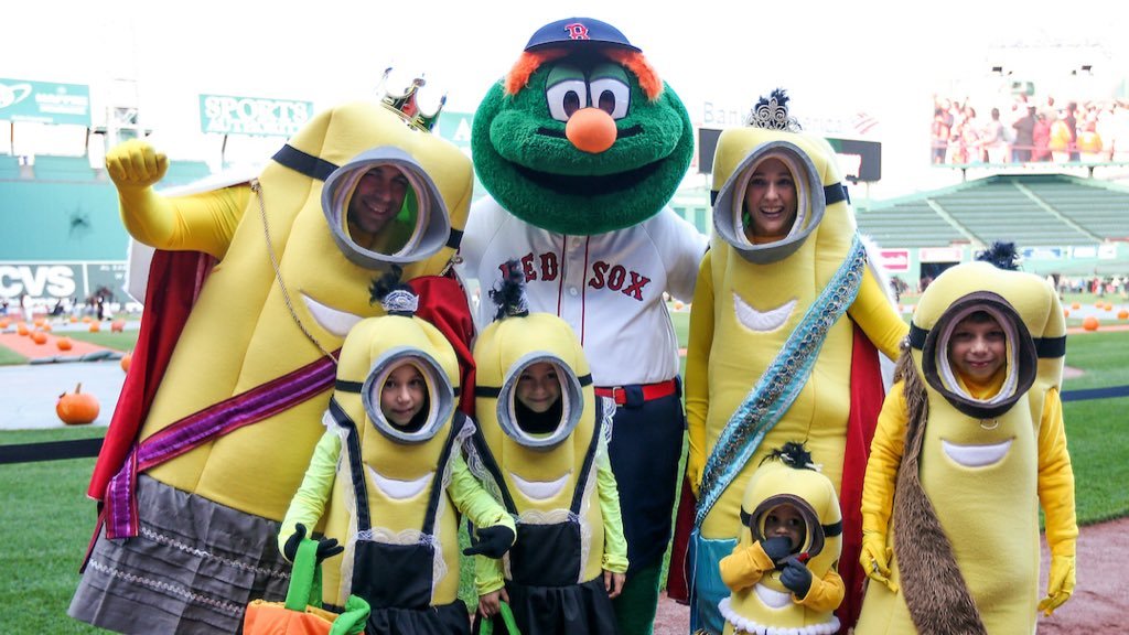 Boston Red Sox Mascot Wally and volunteers throw out souvineer